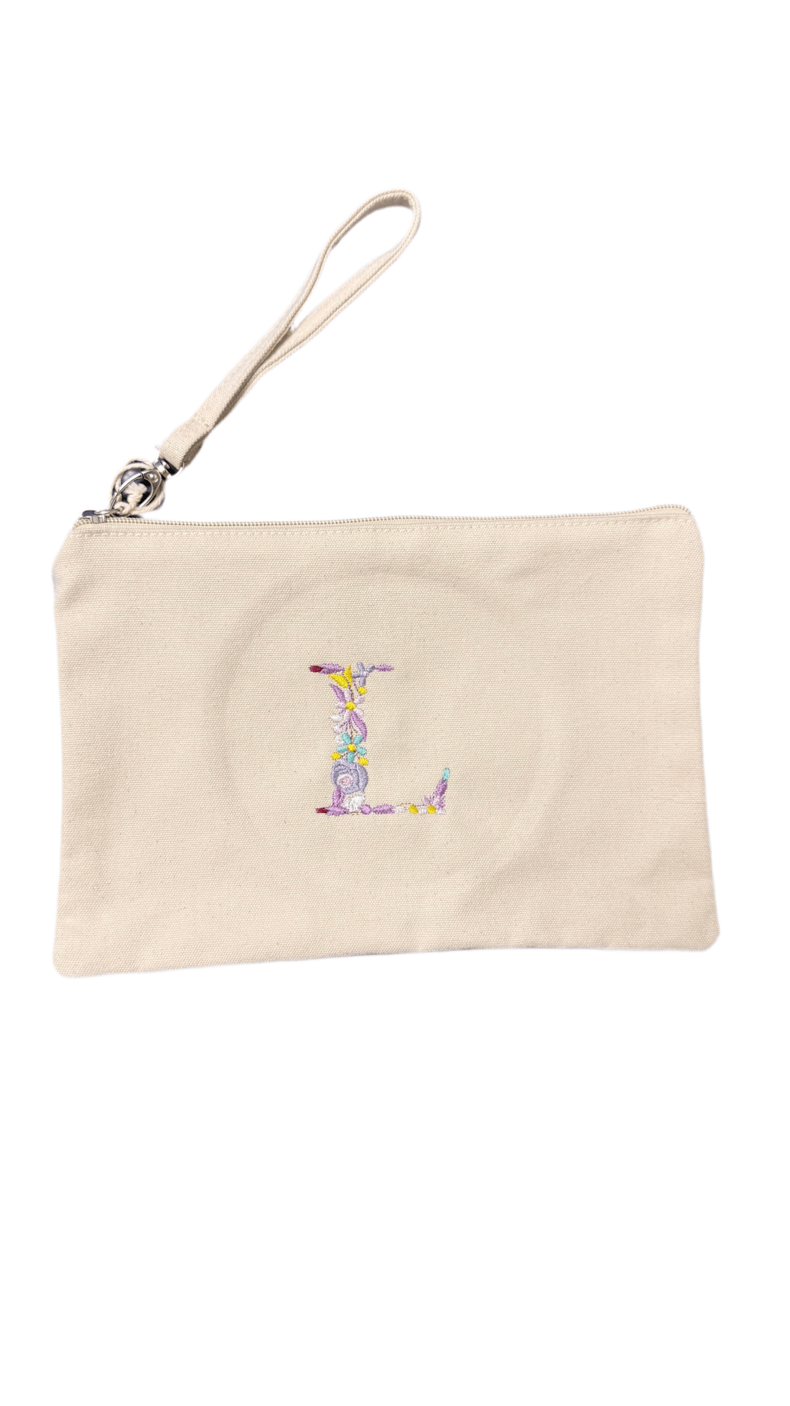 Bolsito de mano con inicial floral bordada - LA FLAMA ESTUDI | Bordados personalizados