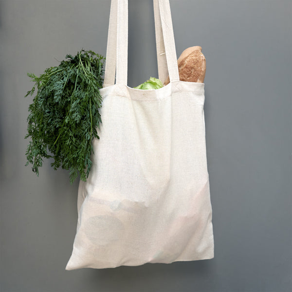 Vista lateral de la tote bag de algodón natural personalizable